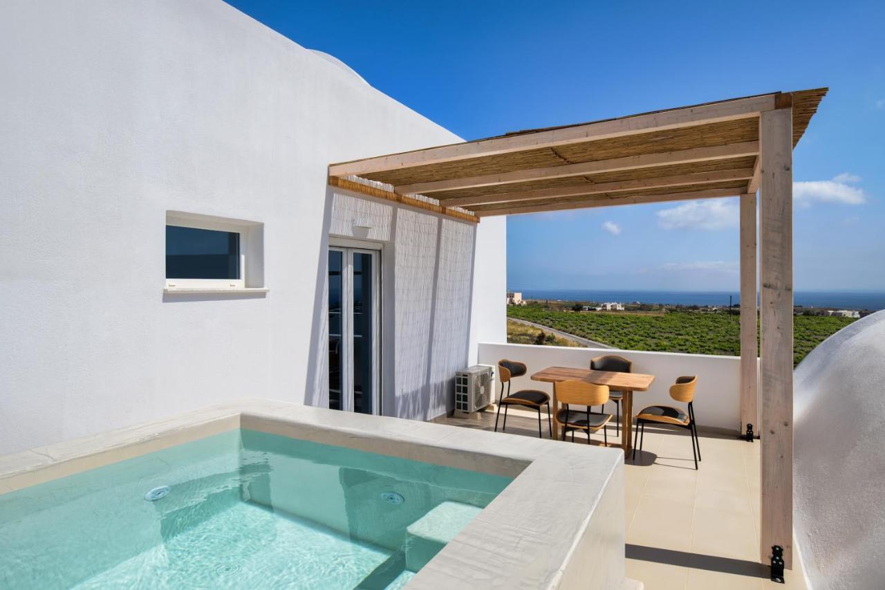 Aelia Luxury Suites Картерадос Экстерьер фото Pergola over a swimming pool